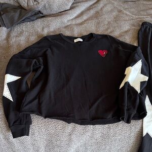 Black Sweatshirt with White Star Sleeves & Red Heart Patch